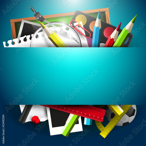 School supplies on blue background with place for text