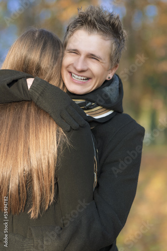 portrait of young happy smiling caucasian couple photo