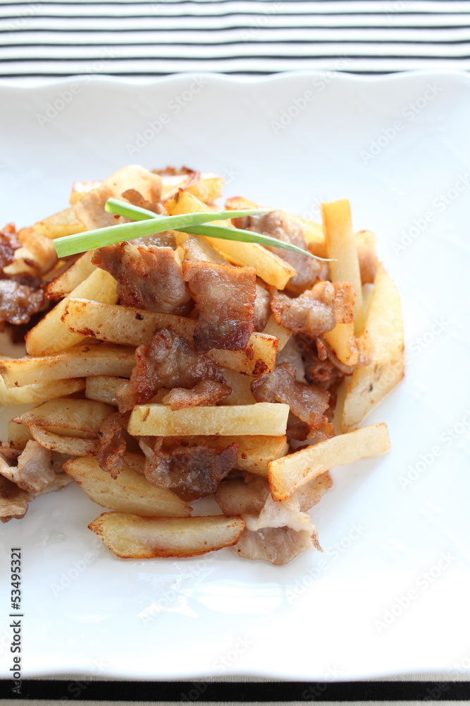 asian cuisine, potato and pork stir fried asian cuisine, potato and pork stir fried