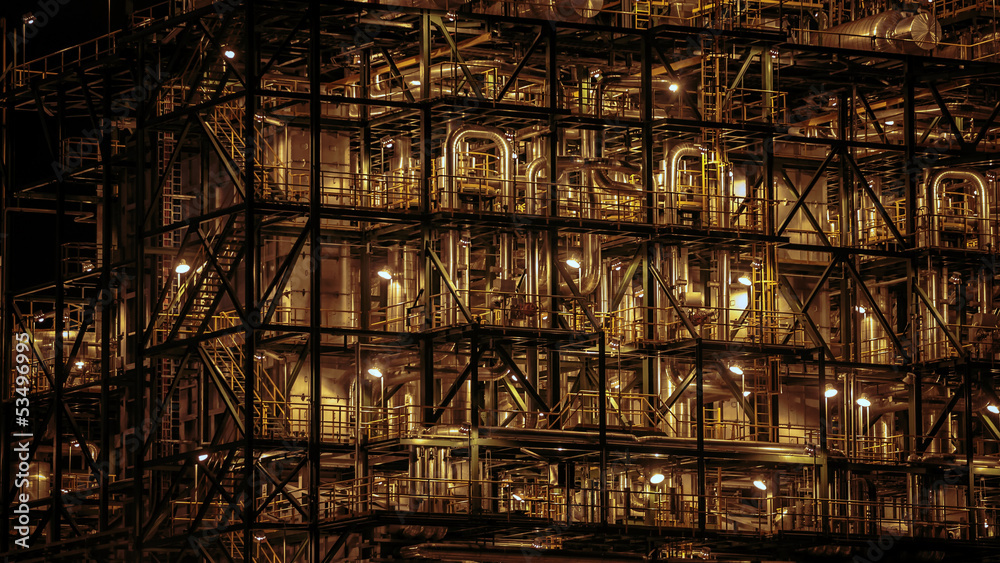 Close-up of industrial pipelines of an oil-refinery plant Close-up of industrial pipelines of an oil-refinery plant