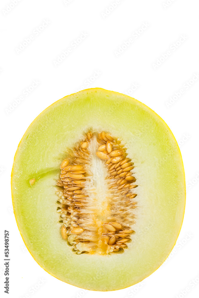 Honeydew cut in half over white background Honeydew cut in half over white background