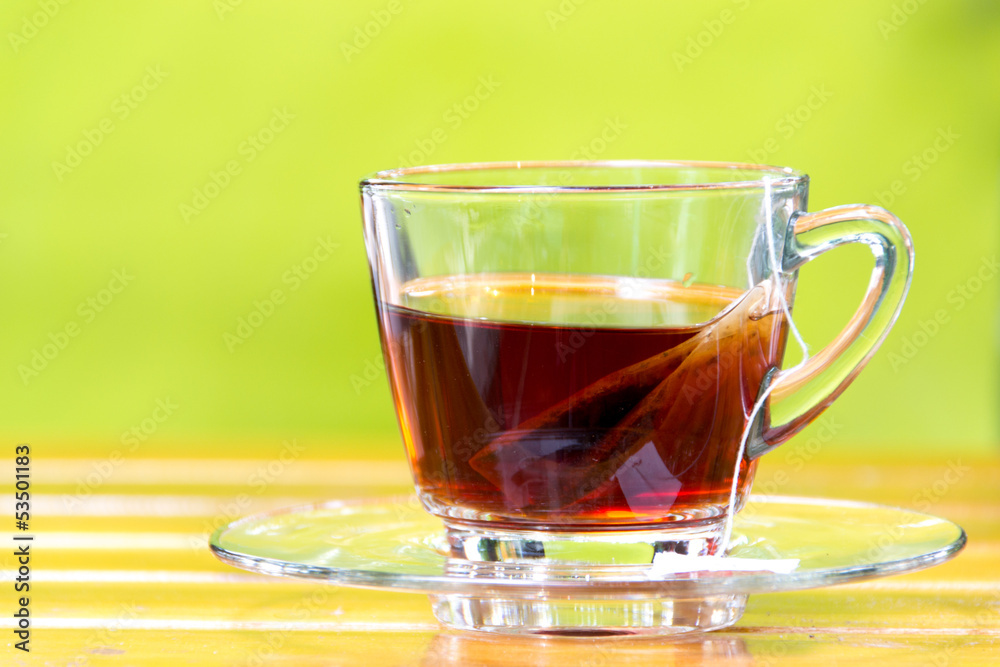 Tea bag in the cup with hot water Tea bag in the cup with hot water