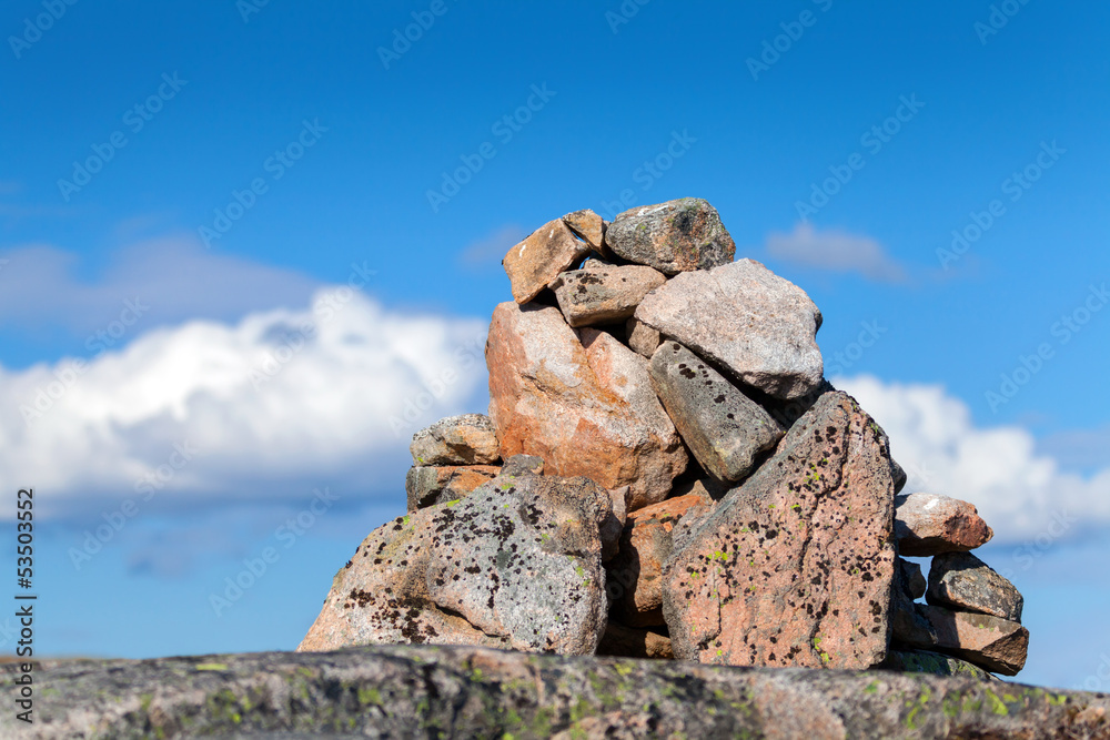 Сairn as a navigation mark on the top of mountain