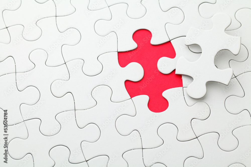 Puzzle with missing piece in red color Puzzle with missing piece in red color