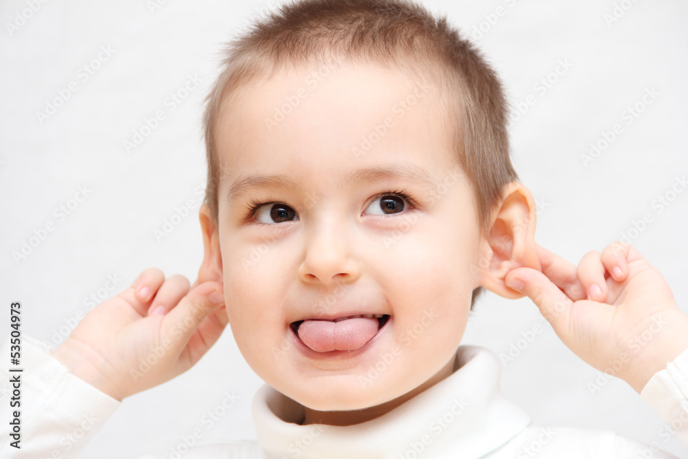 happy child showing tongue