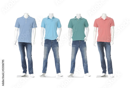 Four male mannequin dressed in jeans with colorful t-shirt