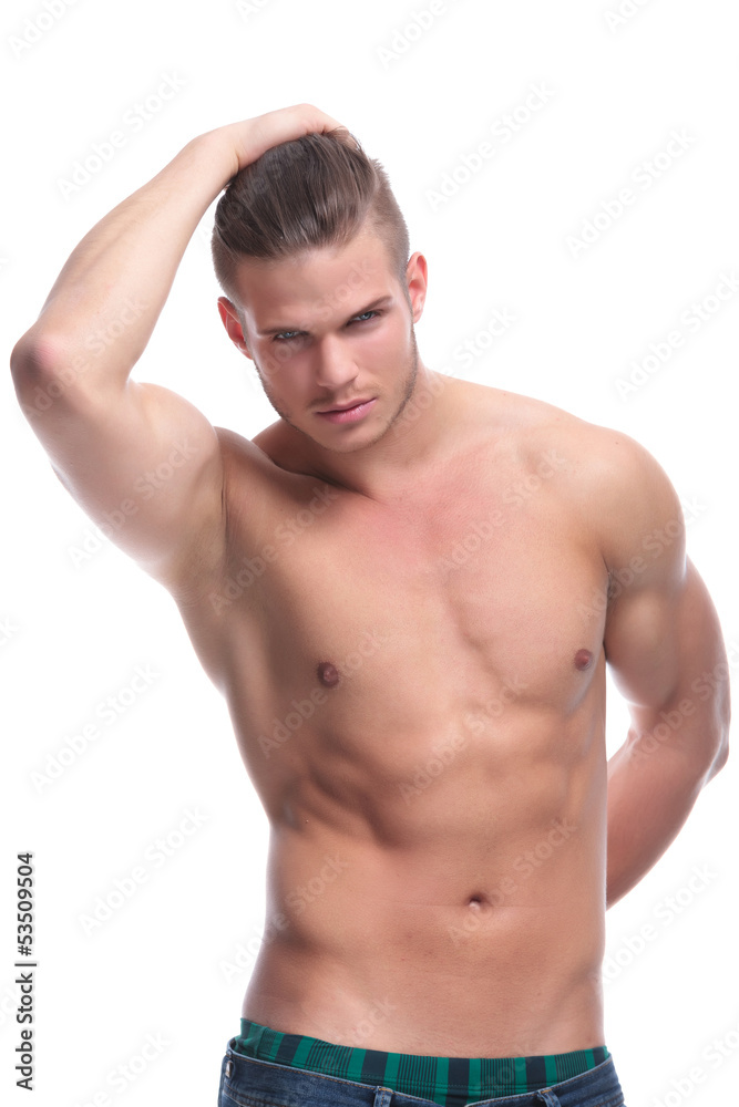 topless fashion man with hand at the back topless fashion man with hand at the back