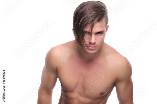 topless fashion man looks into your eyes