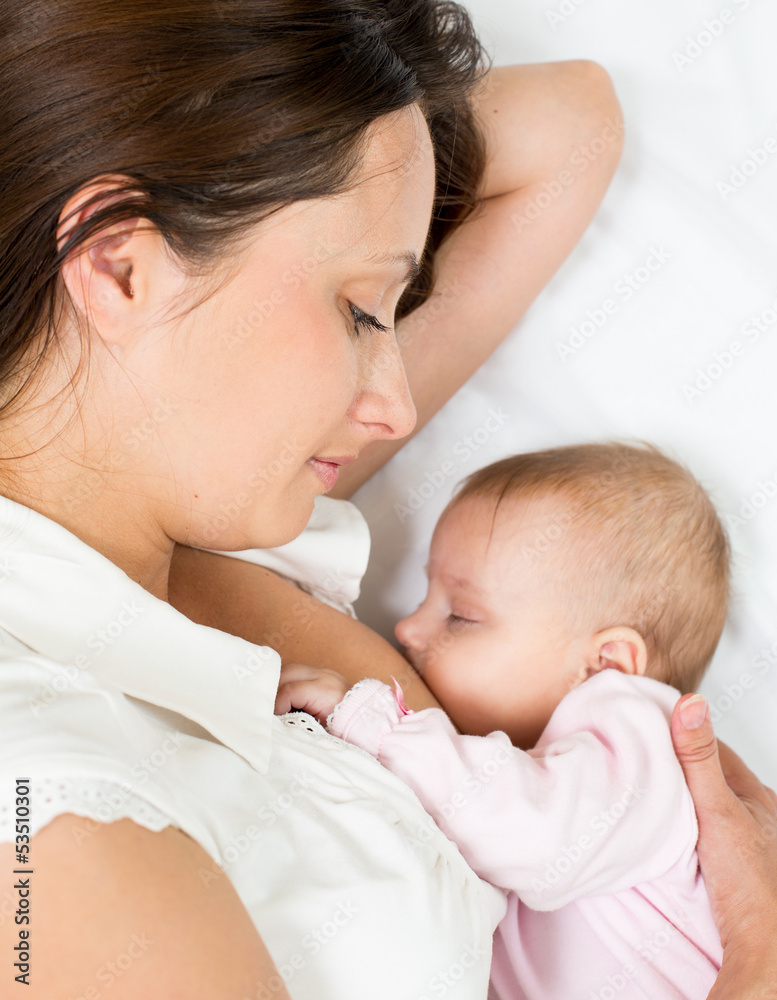 cute mother breast feeding her baby cute mother breast feeding her baby