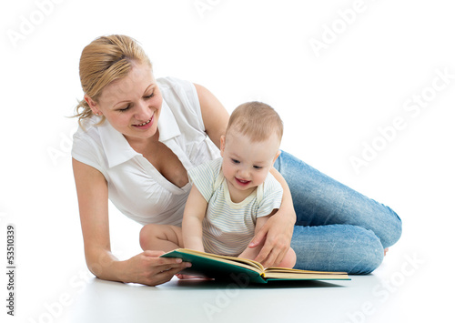 mother reading a book to he...