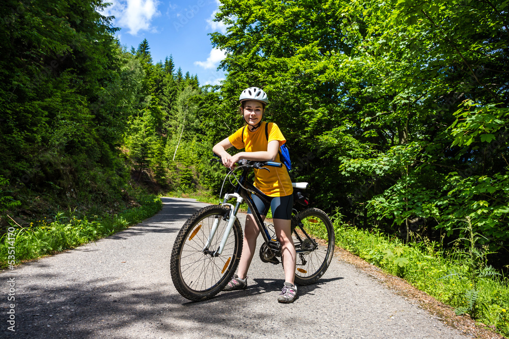 Healthy lifestyle - teenage girl biking