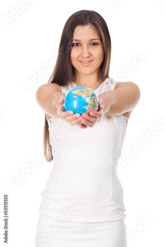 beautiful young woman holding a globe in hands