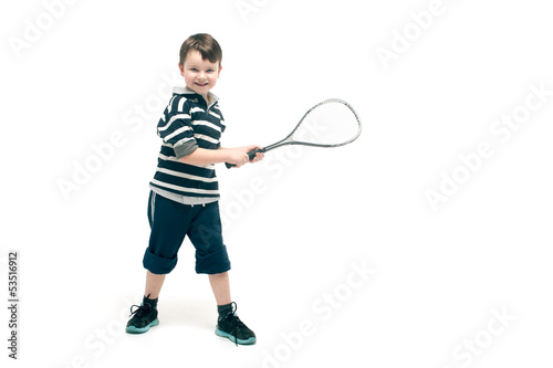 Little boy with tennis racket