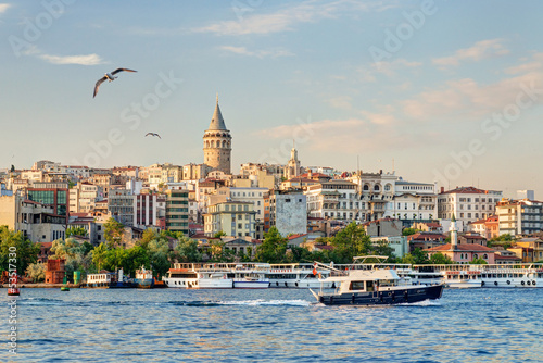 Galata district at sunset, Istanbul, Turkey. View of famous Golden Horn. photo
