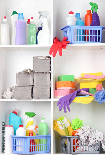 Shelves in pantry with cleaners for home close-up