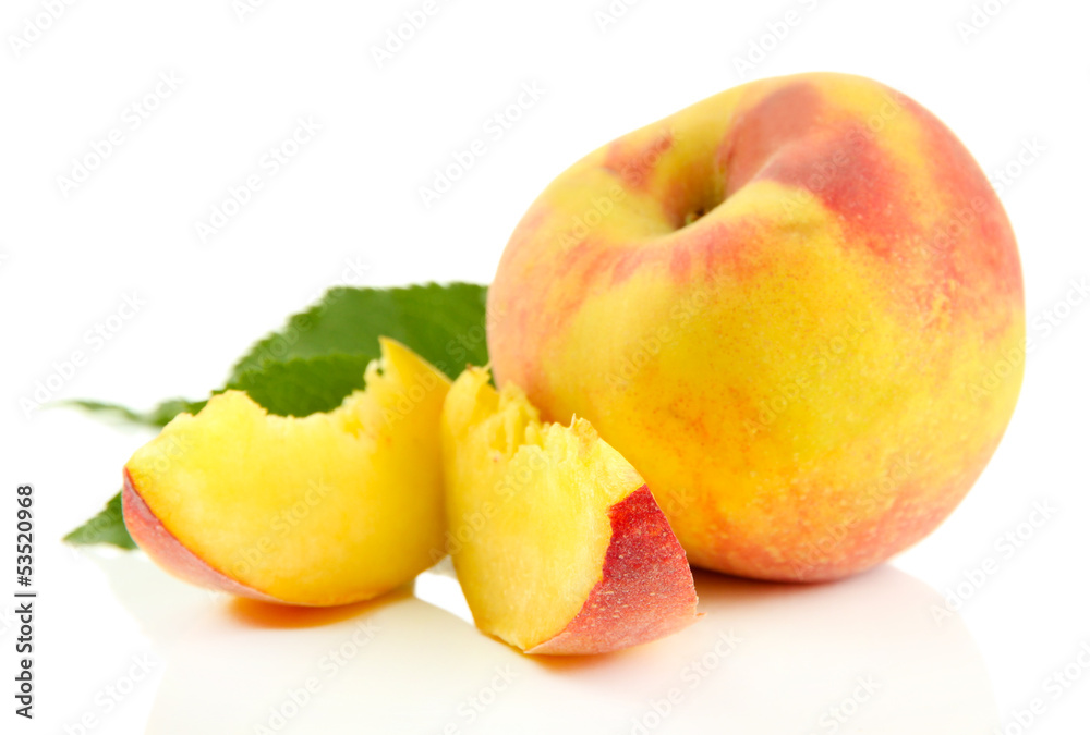 Ripe sweet peach with leaves, isolated on white Ripe sweet peach with leaves, isolated on white