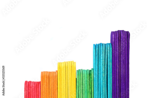 growth graph by ice cream stick on white background