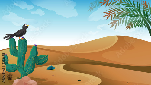 A bird above the cactus plant at the desert