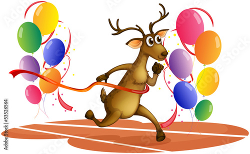 A deer running with balloons