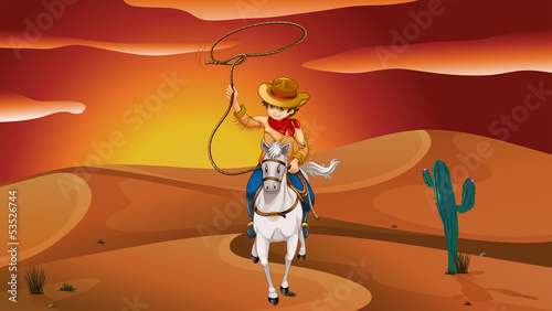A boy holding a rope while riding a horse