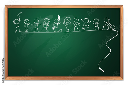 A chalkboard with a drawing of kids playing different sports