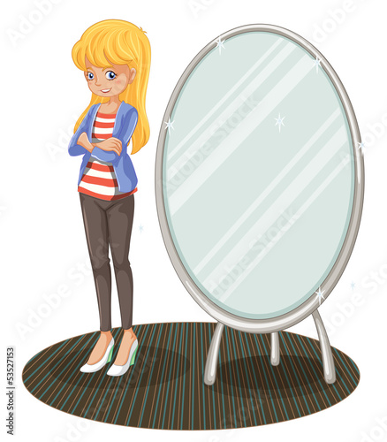 A girl beside a mirror