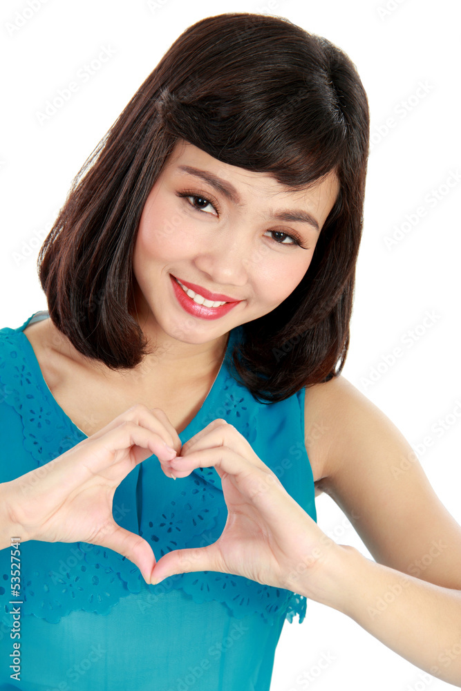 Heart shaped by the hands of a beautiful young women Heart shaped by the hands of a beautiful young women