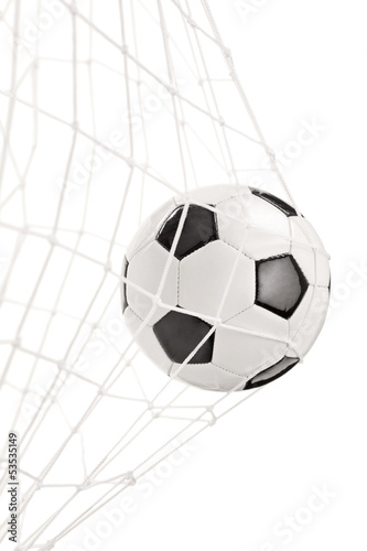 Soccer ball in a goal net