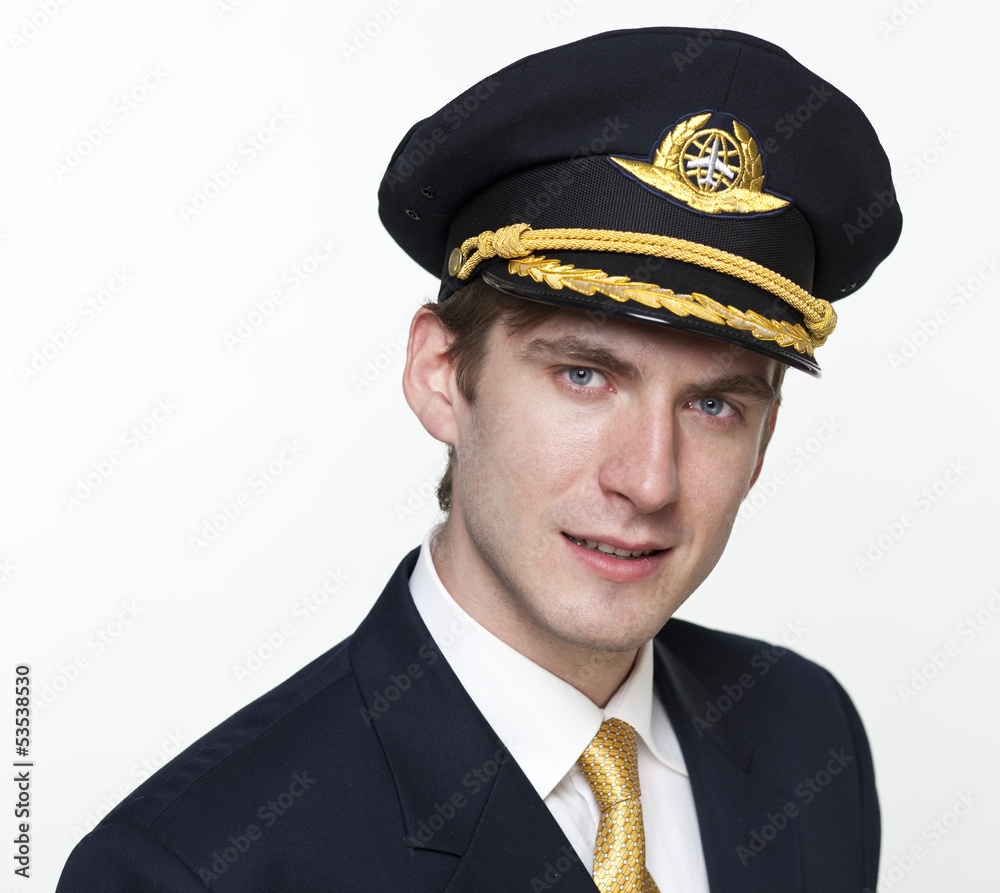 Young man in the form of a passenger plane pilot Young man in the form of a passenger plane pilot