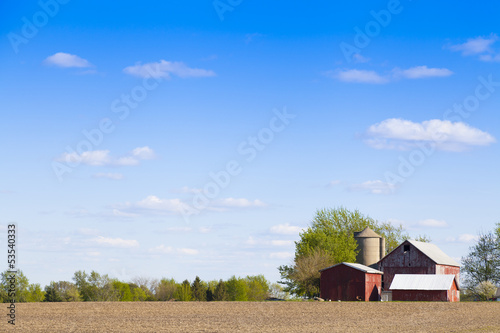 American Farmland With Blue Cloudy Sky