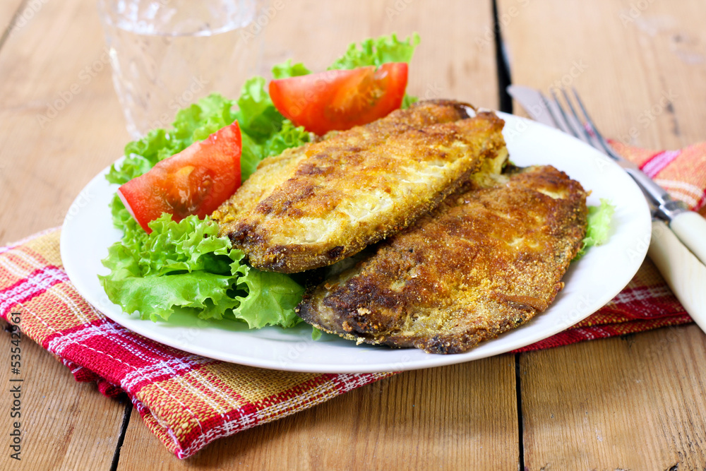 Fried mackerel on plate