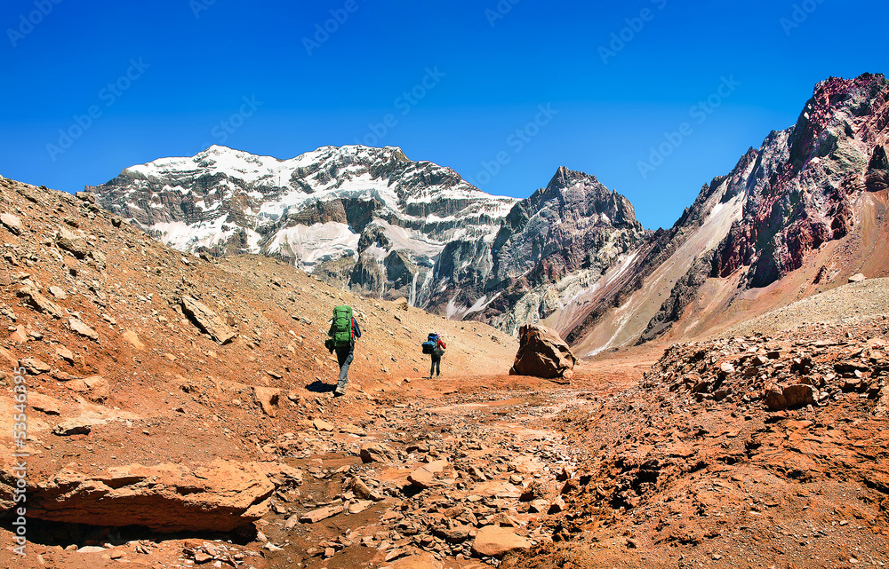 Naklejka premium Hikers trekking in the Andes, Argentina, South America