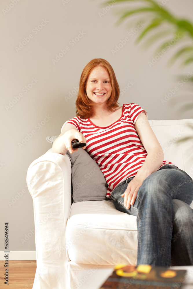 Entertainment - a woman watching TV