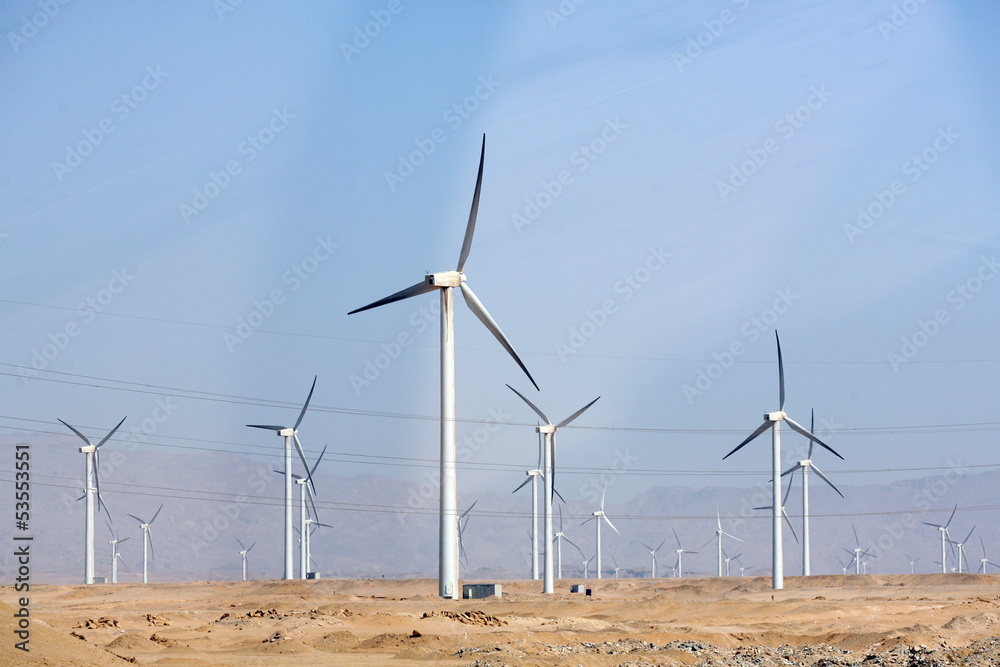 Electric wind turbine generators in the desert in Egypt Electric wind turbine generators in the desert in Egypt