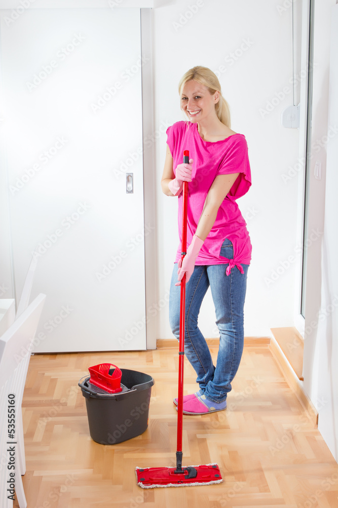 Young Woman Cleaning Home