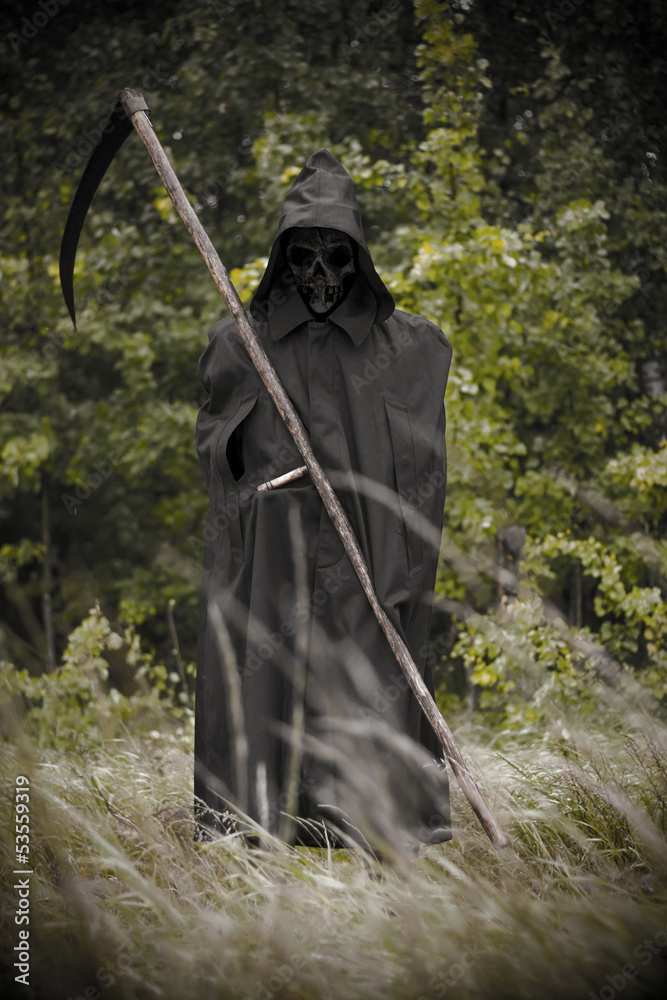 Death standing with scythe on hand