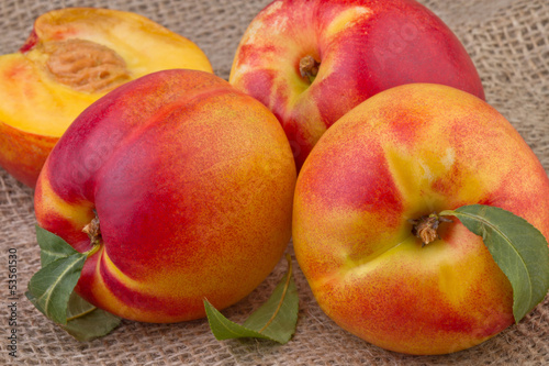 fresh nectarine or peach on wooden  background