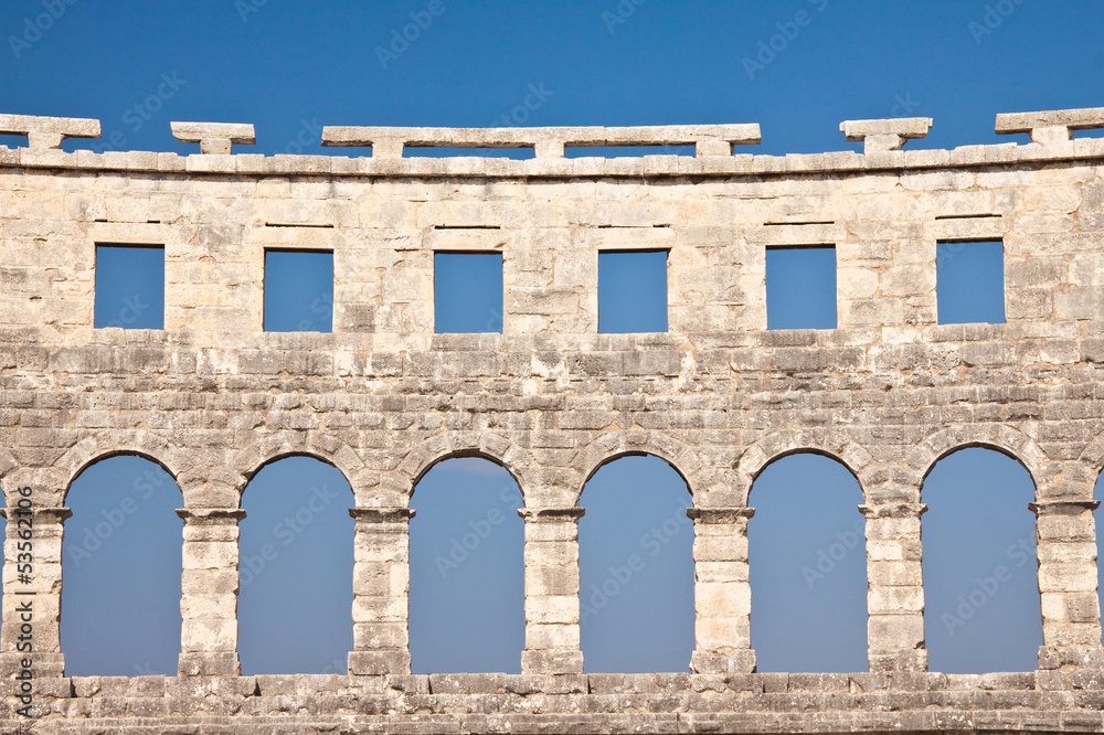 Naklejka premium Wall of the ancient amphitheater. Pula. Croatia