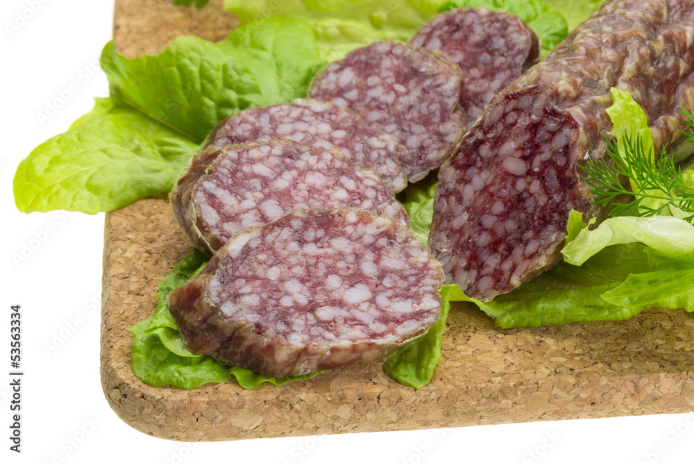 Salami with rosemary, salad and tomatoes Salami with rosemary, salad and tomatoes
