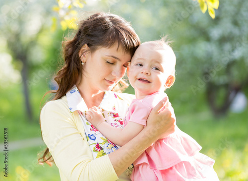 loving mother with baby gir...