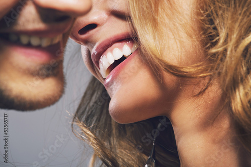 Close up photo of cheerful young couple