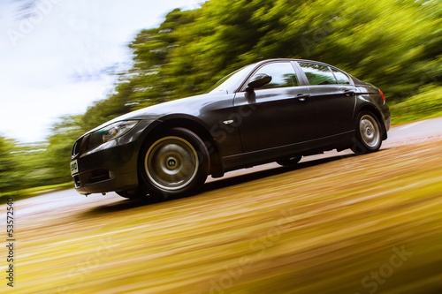 Side view of luxury sedan.