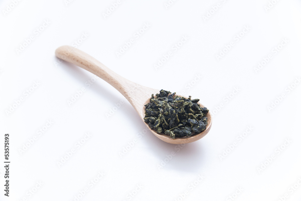 Chinese Tea (Tie Guan Yin) with wooden spoon on White Background Chinese Tea (Tie Guan Yin) with wooden spoon on White Background