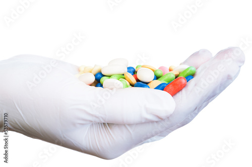 Glove with pills