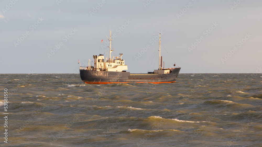 Small coastal vessel in the waters of the dutch Ijsselmeer Small coastal vessel in the waters of the dutch Ijsselmeer