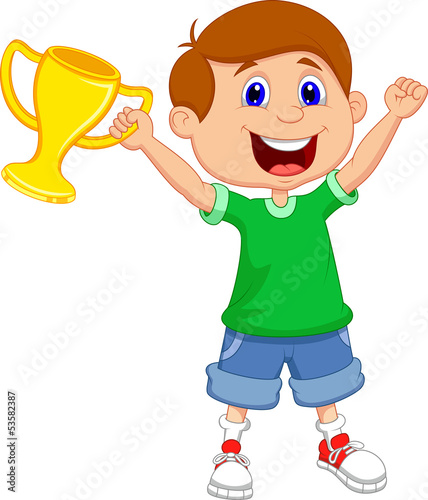 Boy holding gold trophy