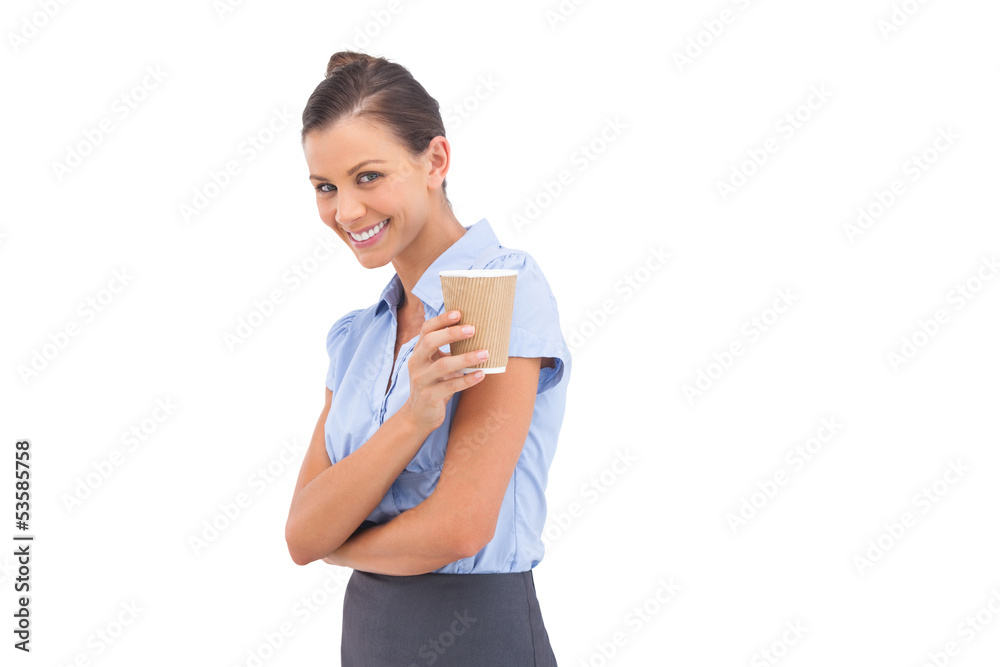 Laughing businesswoman holding coffee cup Laughing businesswoman holding coffee cup