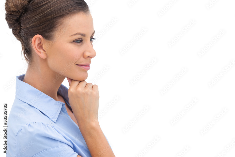 Thinking businesswoman with hand on chin Thinking businesswoman with hand on chin