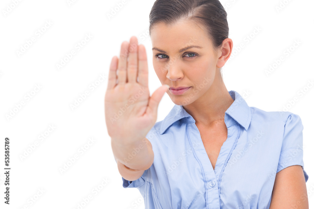 Businesswoman showing stop with hand Businesswoman showing stop with hand