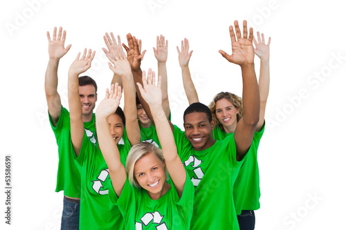 Group of environmental activists raising arms